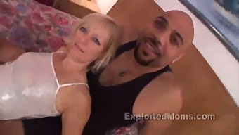 A Mature Blonde Woman Engages In Sexual Activity With An Inexperienced Partner Who Possesses A Large Black Penis, As Captured In A Steamy Video