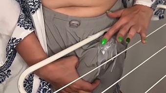 Stepson Watches As His Stepmother'S Huge Cock Rubs Against The Clothes Dryer