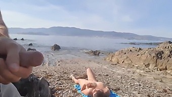 A Nude Couple Encounters A Public Exhibitionist On The Beach